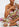 Witte, roze en kakigroene jumpsuit met bloemenprint Faume - seconde main