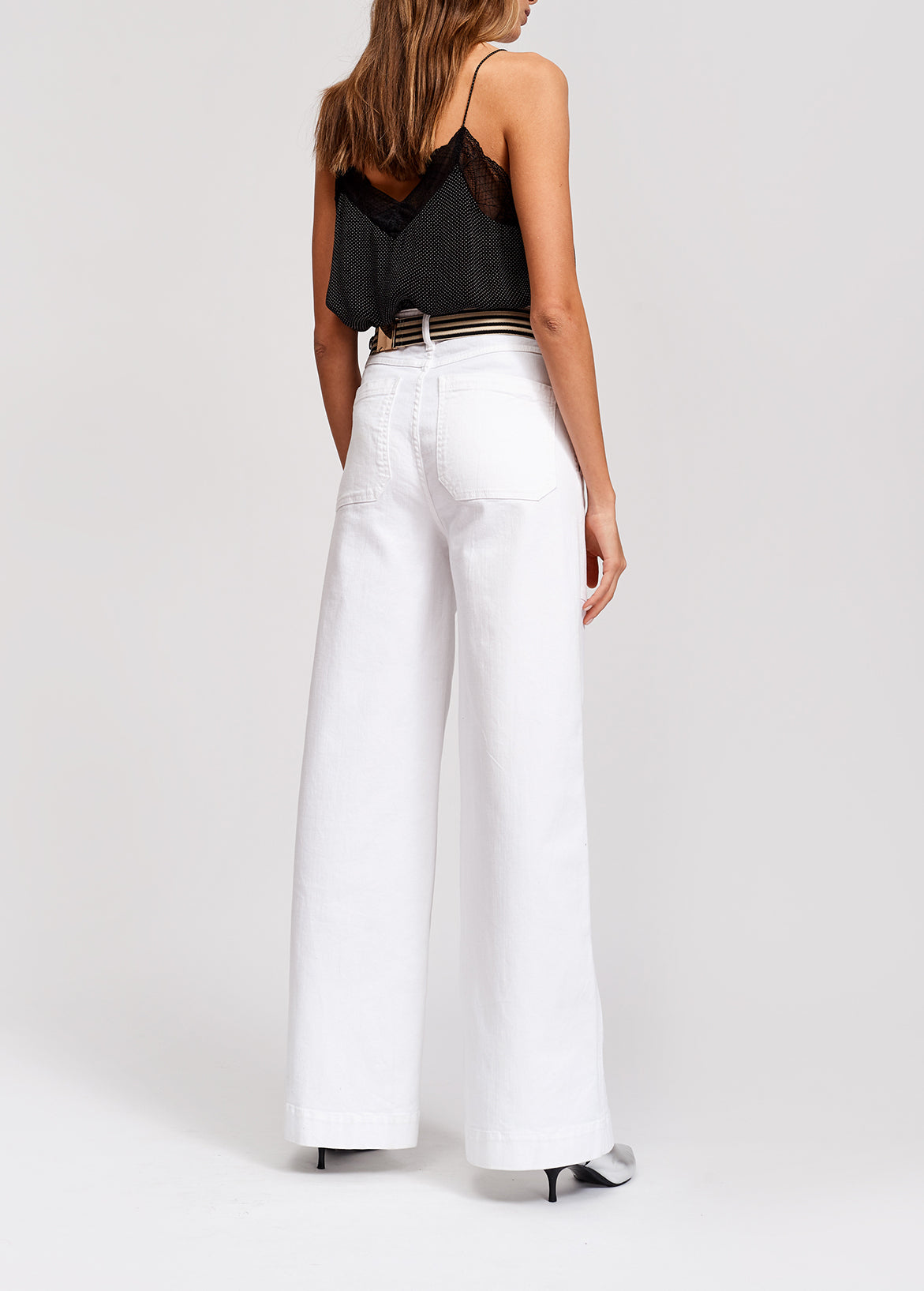 White flared high wide leg pants. RE—SSENTIEL | Essentiel second hand