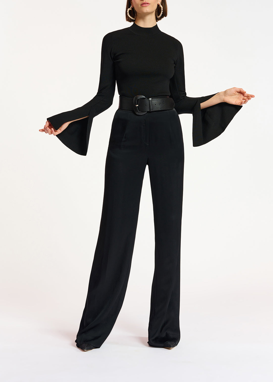 Black slim-fit knit sweater with trumpet sleeves RE—SSENTIEL | Essentiel second hand