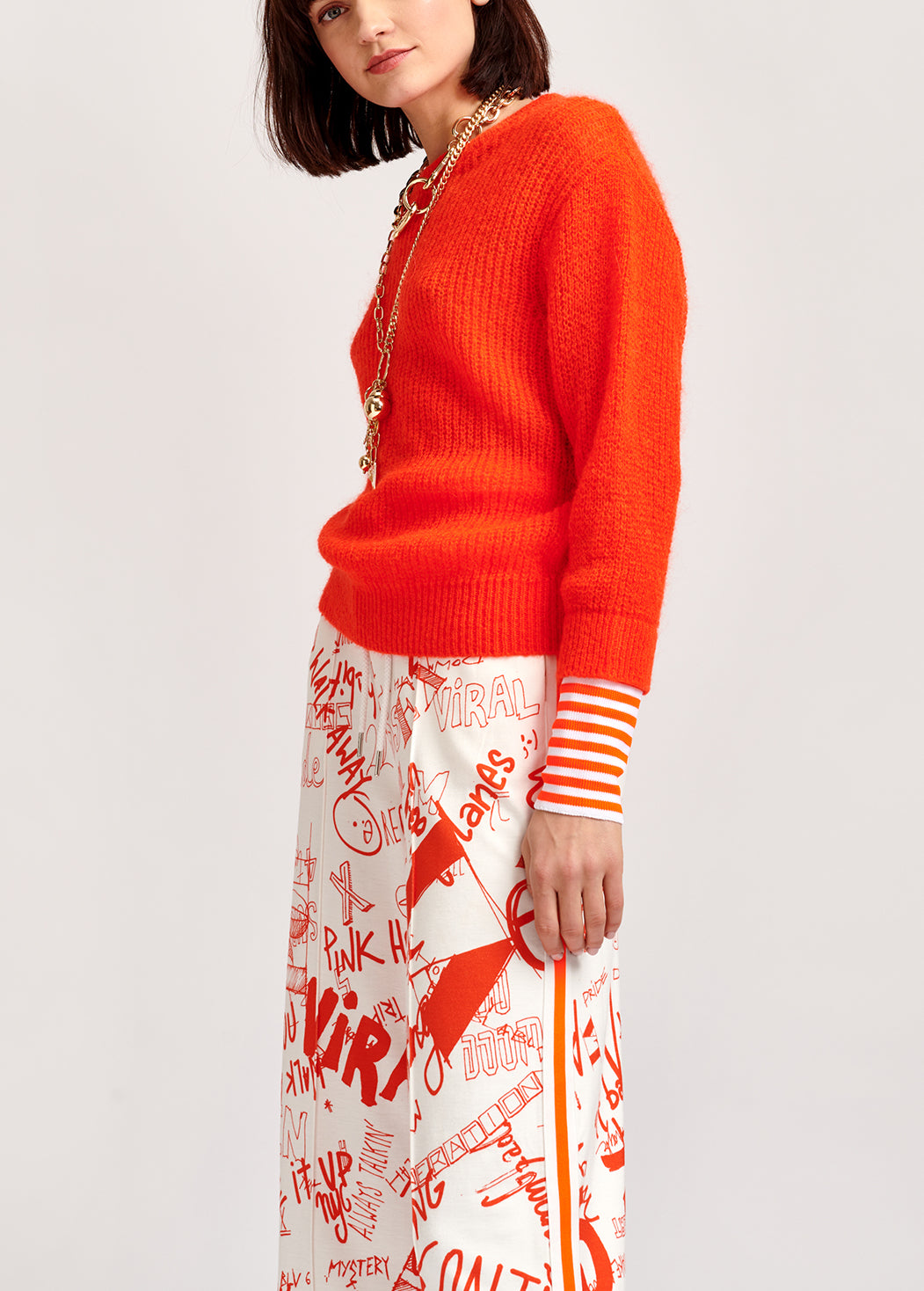 Neon orange ribbed-knit sweater with striped neon cuffs RE—SSENTIEL | Essentiel second hand