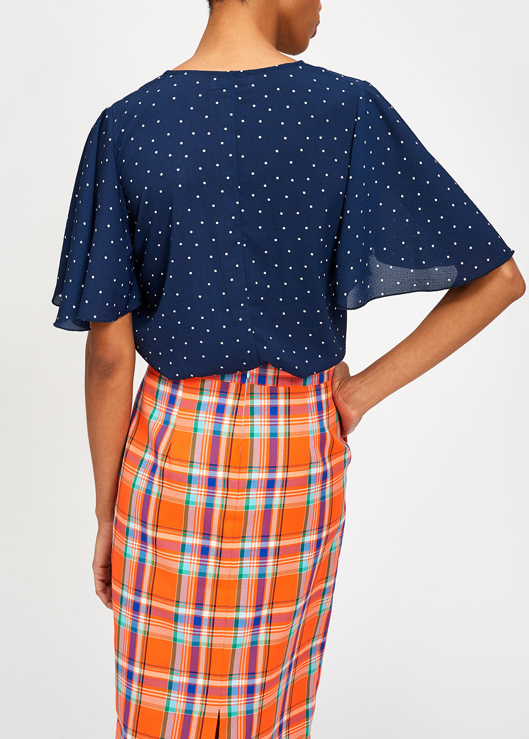 Dark blue polka dot v-neck top RE—SSENTIEL | Essentiel second hand