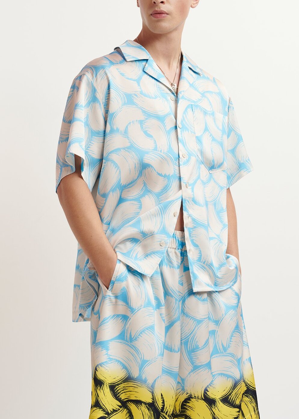 Blue and off-white short-sleeved shirt with abstract print RE—SSENTIEL | Essentiel second hand