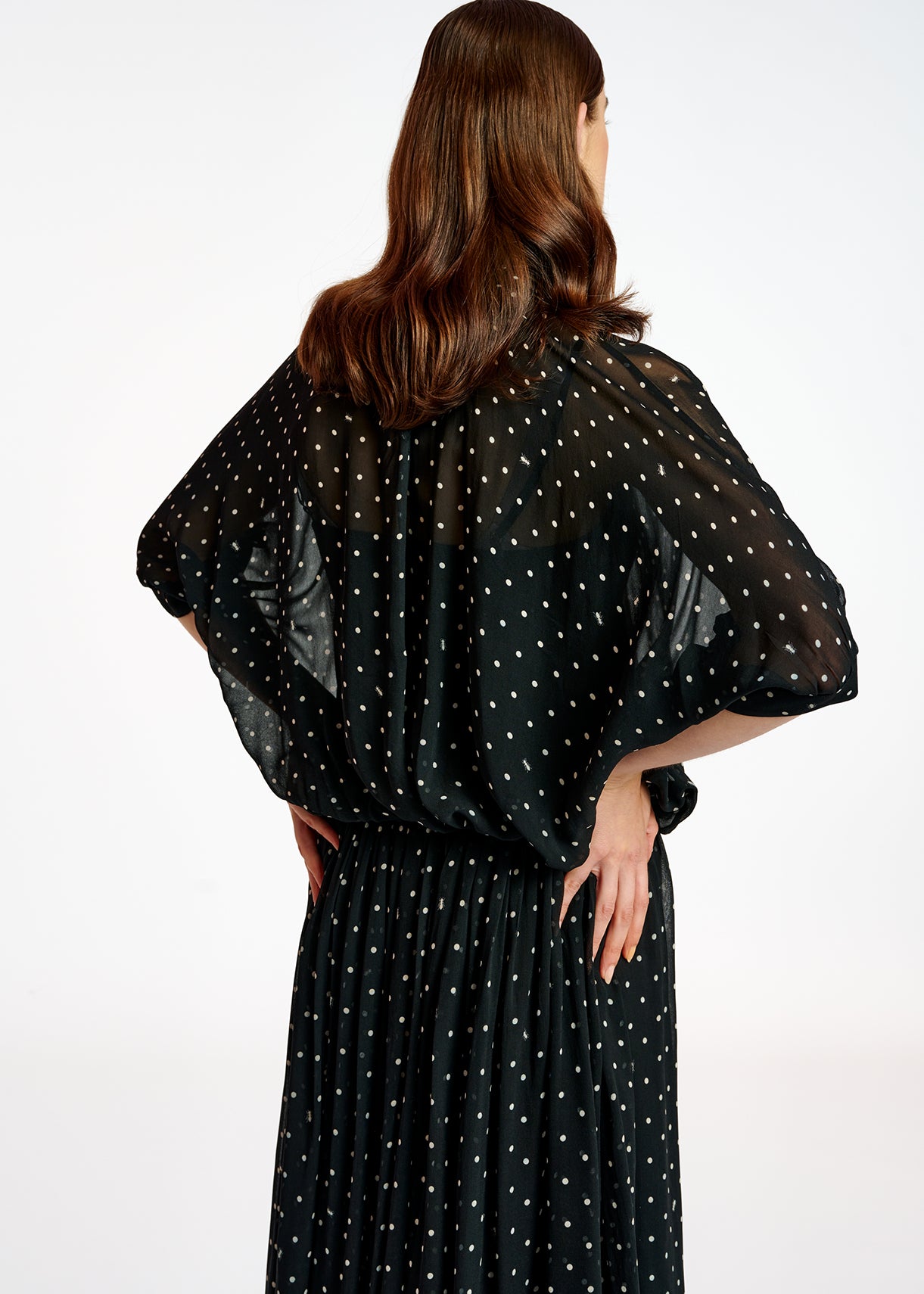 Zwart en witte volumineuze top met stippen RE—SSENTIEL | Essentiel second hand