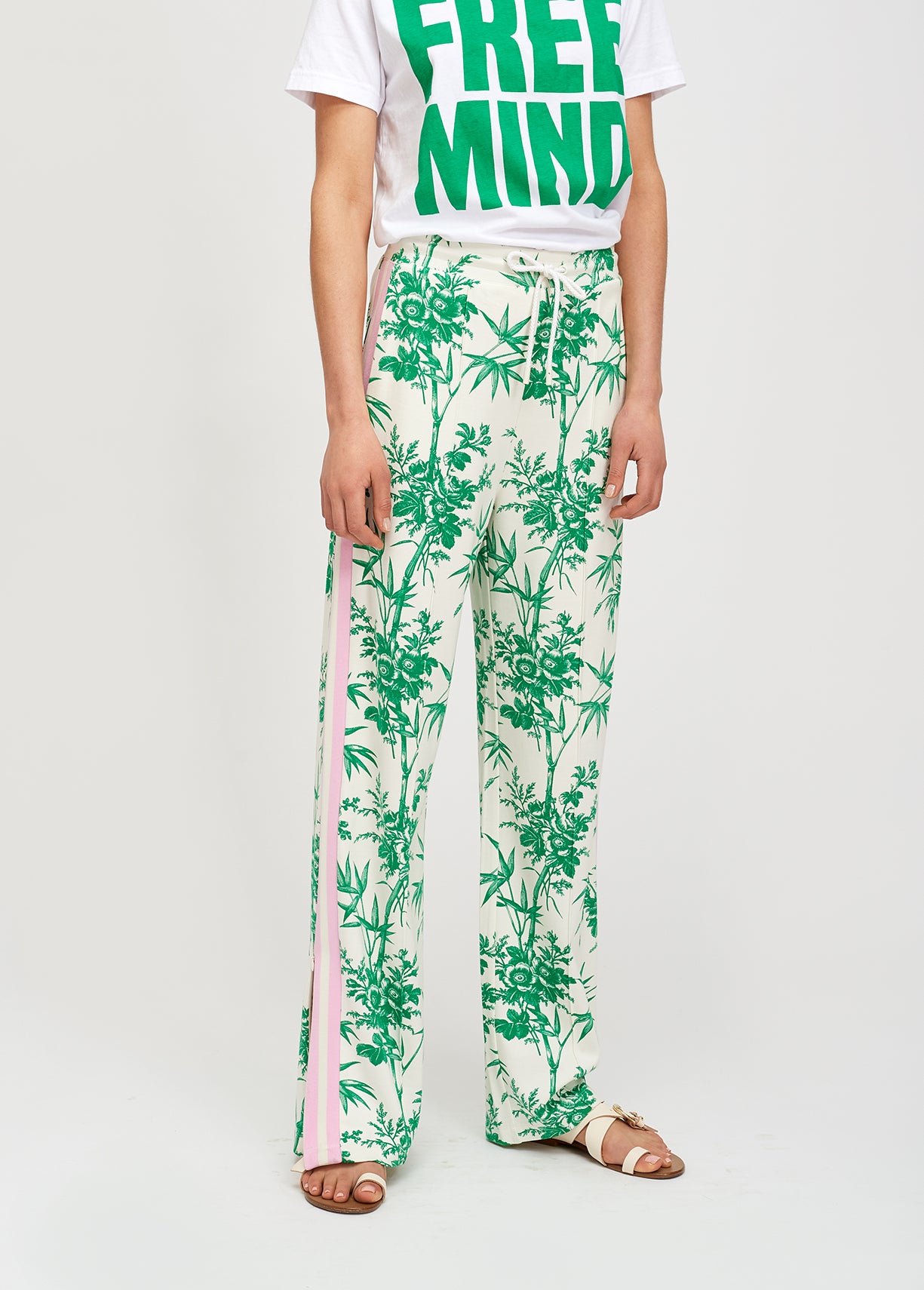 Classic white tracksuit bottoms with green print RE—SSENTIEL | Essentiel second hand