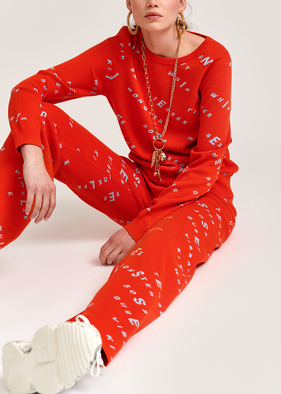 Orange knitted sweater with light blue print RE—SSENTIEL | Essentiel second hand