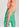 Pantalon de survêtement vert, gris et pêche Faume - seconde main