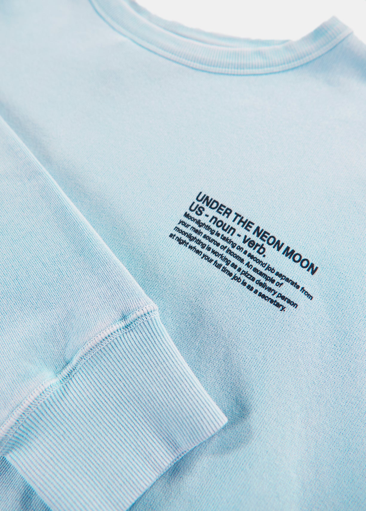 Light blue cotton sweatshirt with orange UNDER THE NEON MOON print RE—SSENTIEL | Essentiel second hand