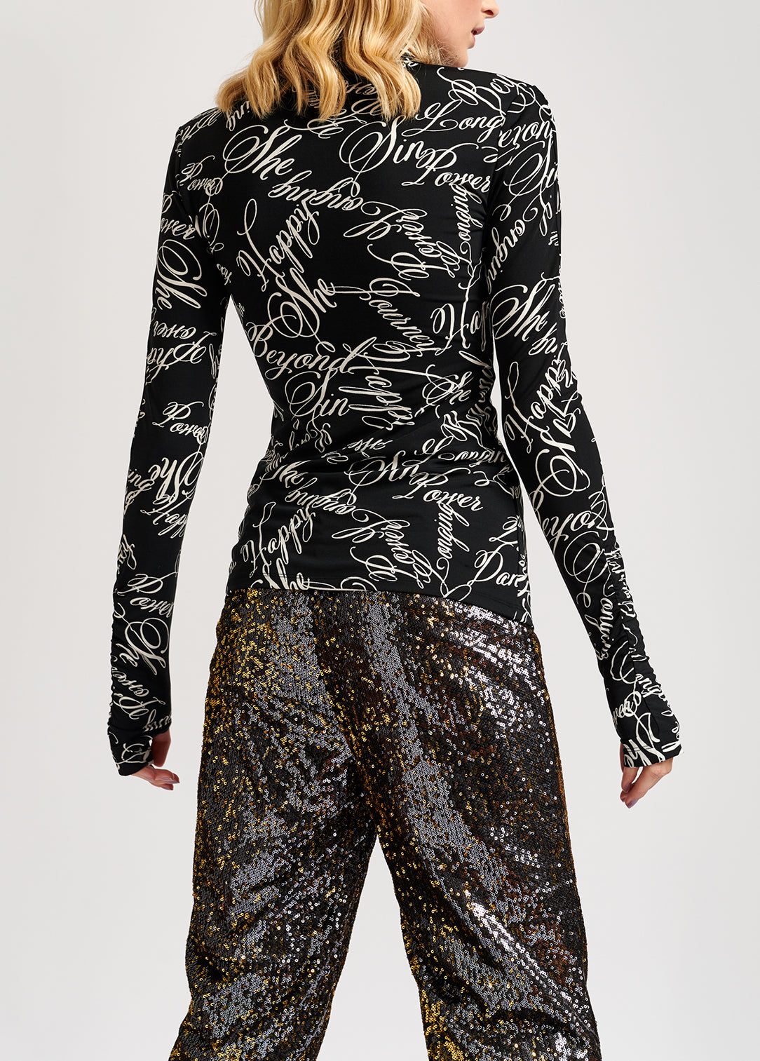 Black turtleneck top with script-print RE—SSENTIEL | Essentiel second hand