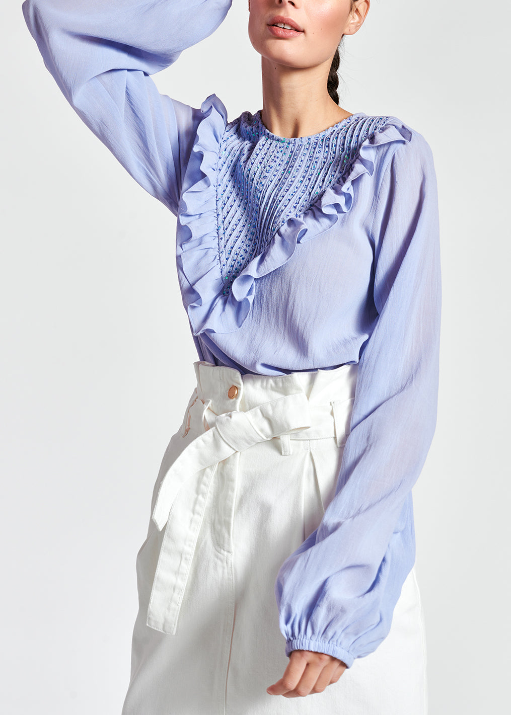 Lichtblauwe top met ruches en pailletten RE—SSENTIEL | Essentiel second hand