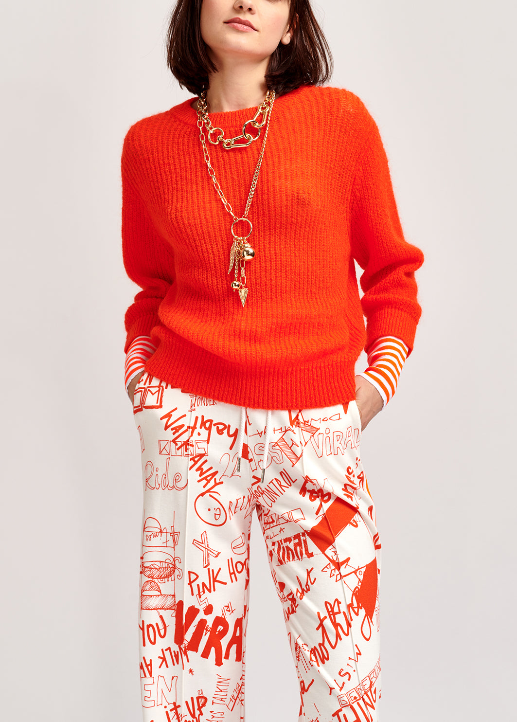 Neon orange ribbed-knit sweater with striped neon cuffs RE—SSENTIEL | Essentiel second hand