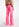 Jean rose fluo aux jambes larges Faume - seconde main
