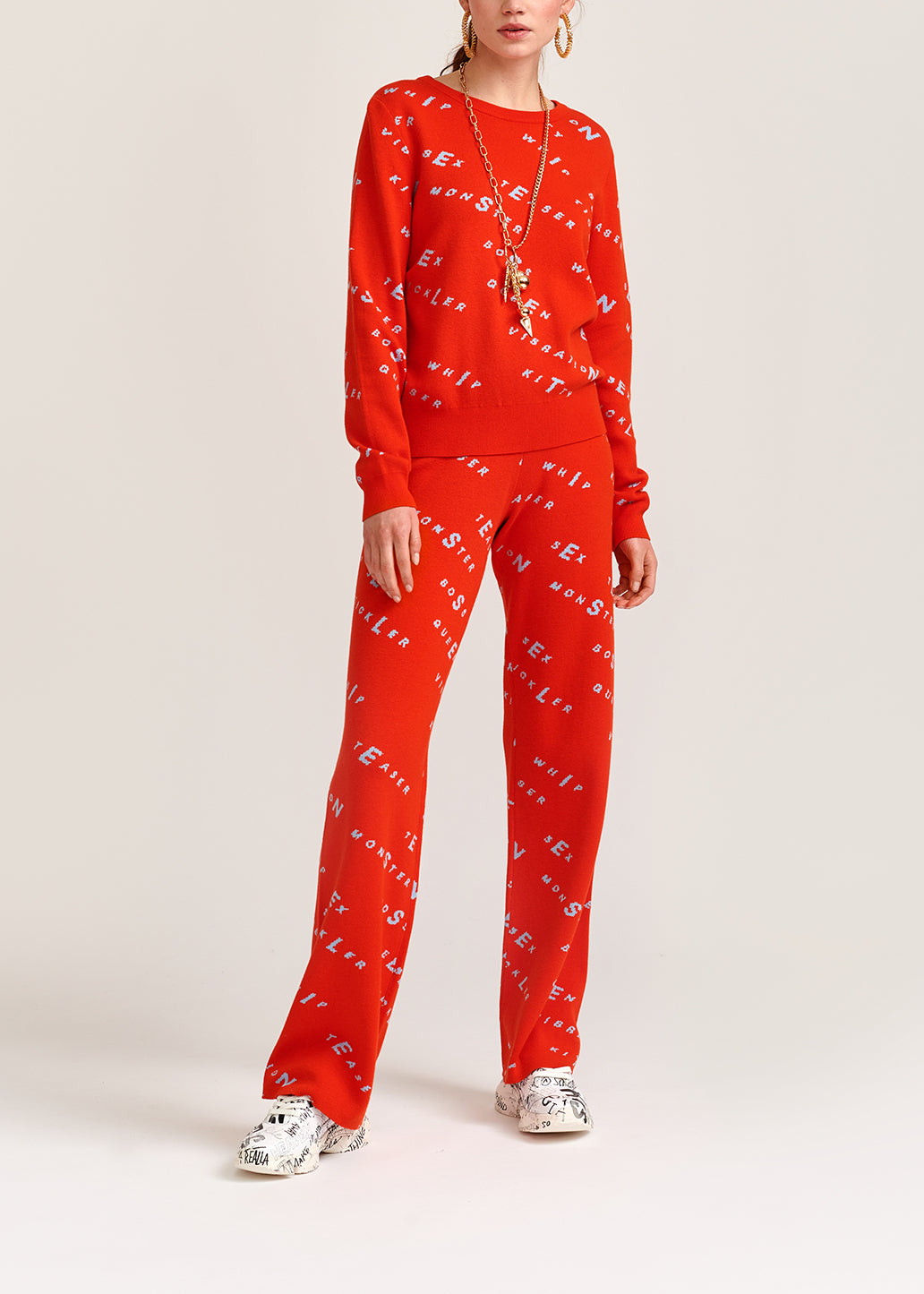 Orange knitted sweater with light blue print RE—SSENTIEL | Essentiel second hand