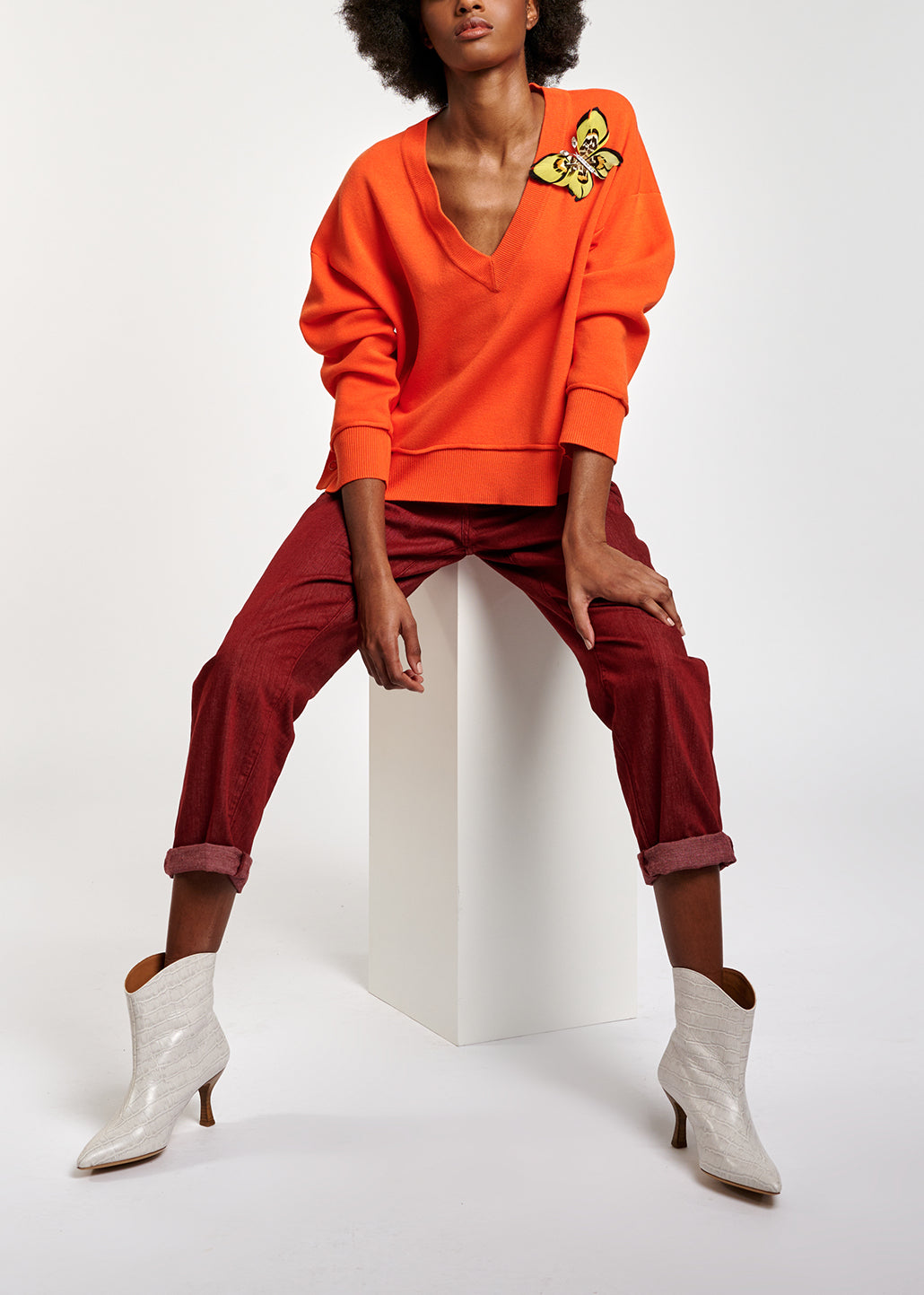 Pull carré orange à encolure en v RE—SSENTIEL | Essentiel second hand