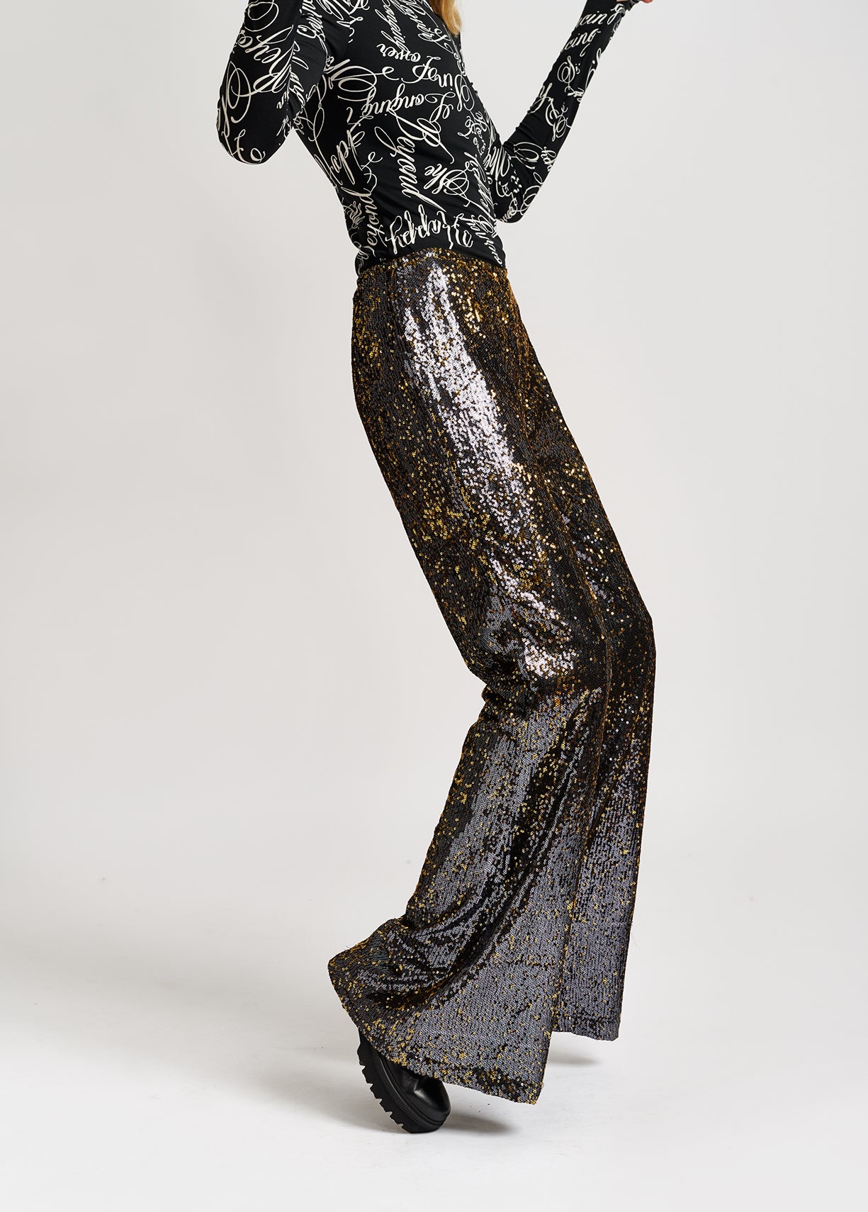 Black and gold sequined flared pants RE—SSENTIEL | Essentiel second hand