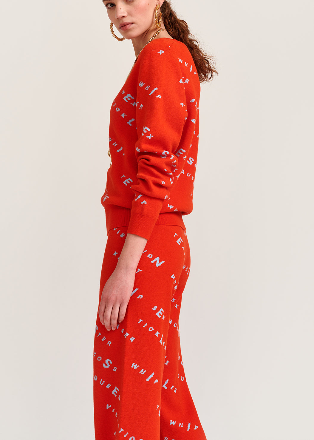 Orange knitted sweater with light blue print RE—SSENTIEL | Essentiel second hand