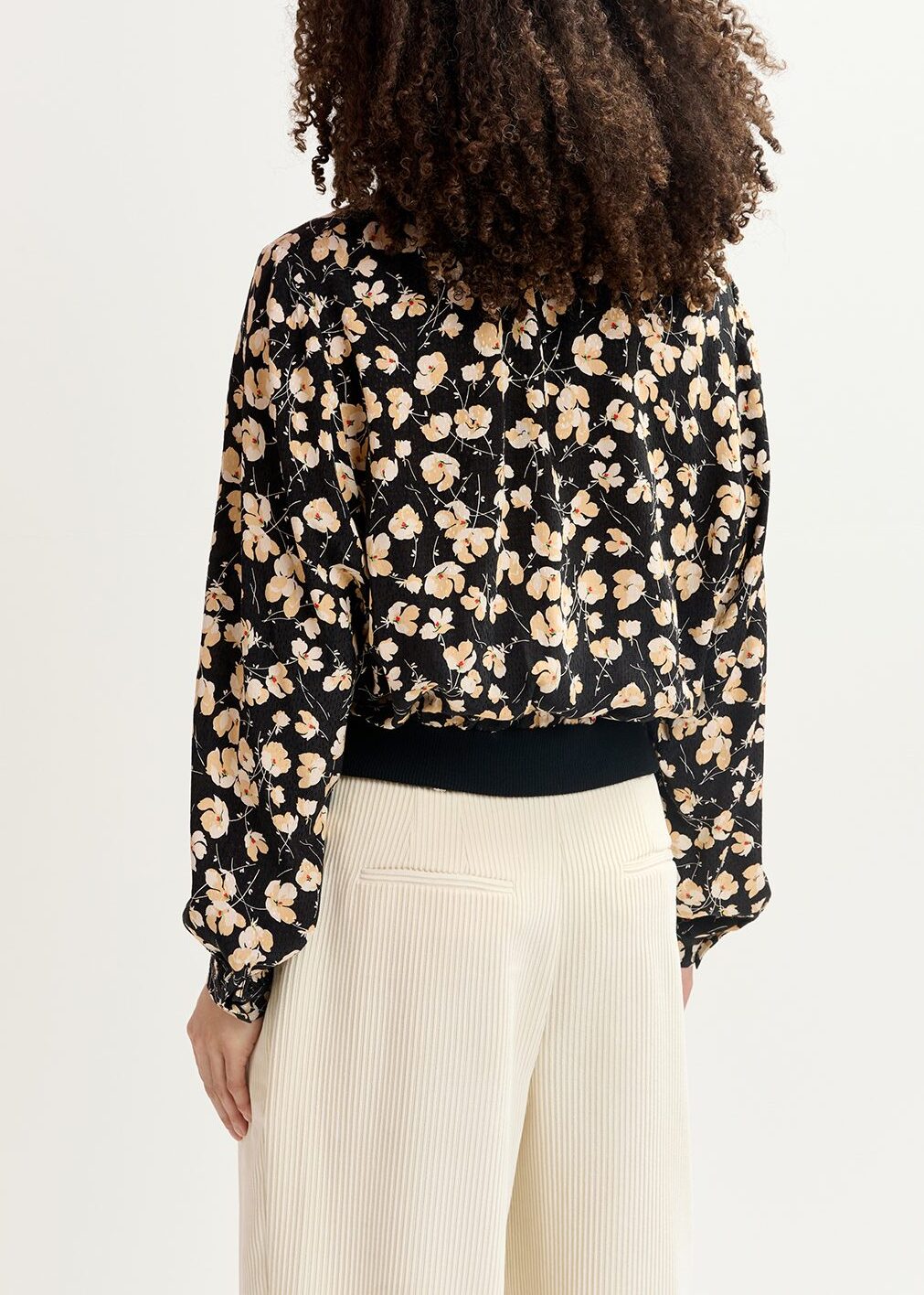 Zwart polo met bloemenprint RE—SSENTIEL | Essentiel second hand