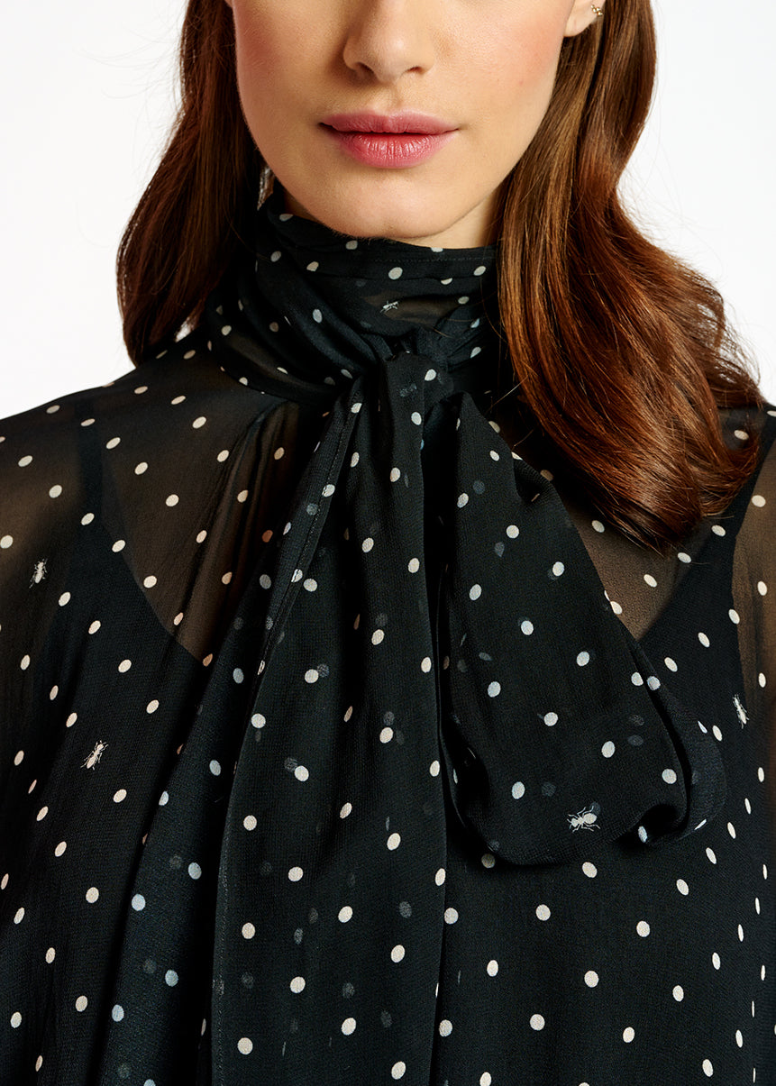 Zwart en witte volumineuze top met stippen RE—SSENTIEL | Essentiel second hand