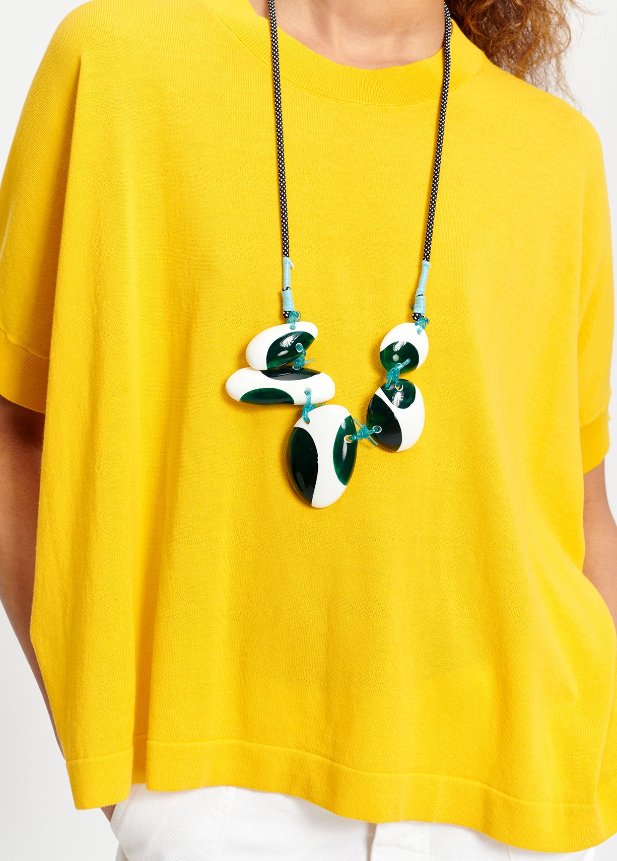 Pull en maille en coton jaune à la coupe asymétrique RE—SSENTIEL | Essentiel second hand