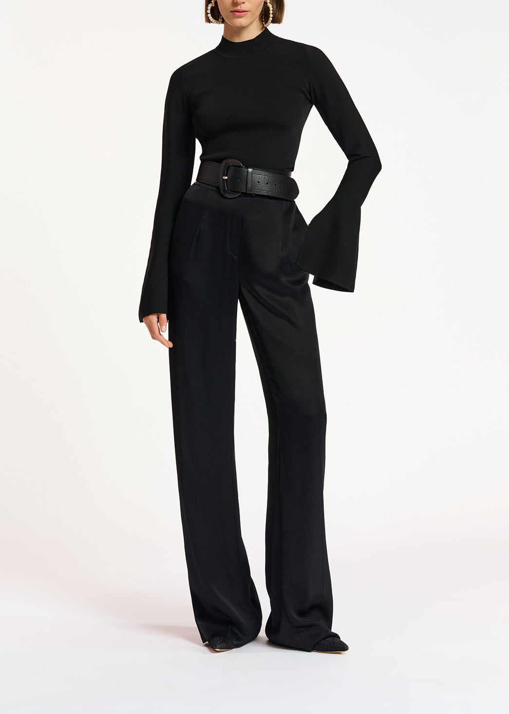 Black slim-fit knit sweater with trumpet sleeves RE—SSENTIEL | Essentiel second hand