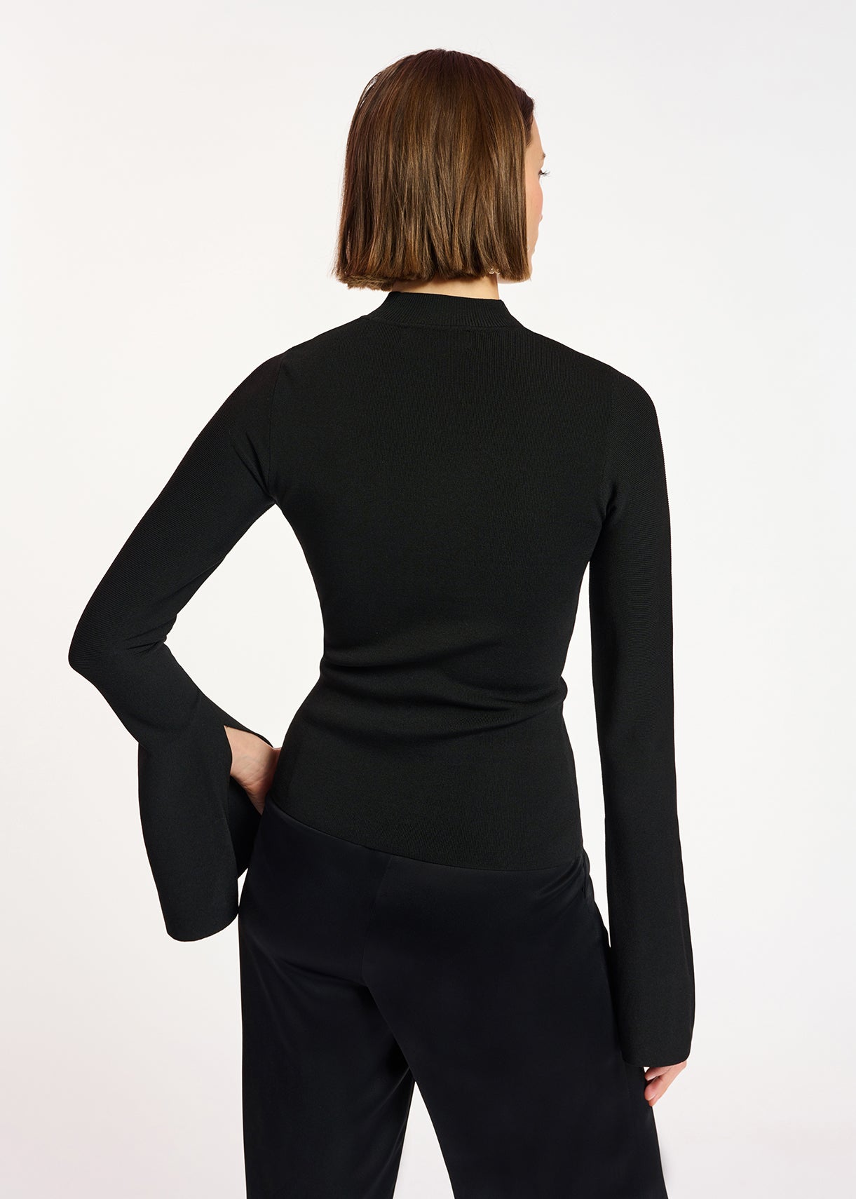 Black slim-fit knit sweater with trumpet sleeves RE—SSENTIEL | Essentiel second hand