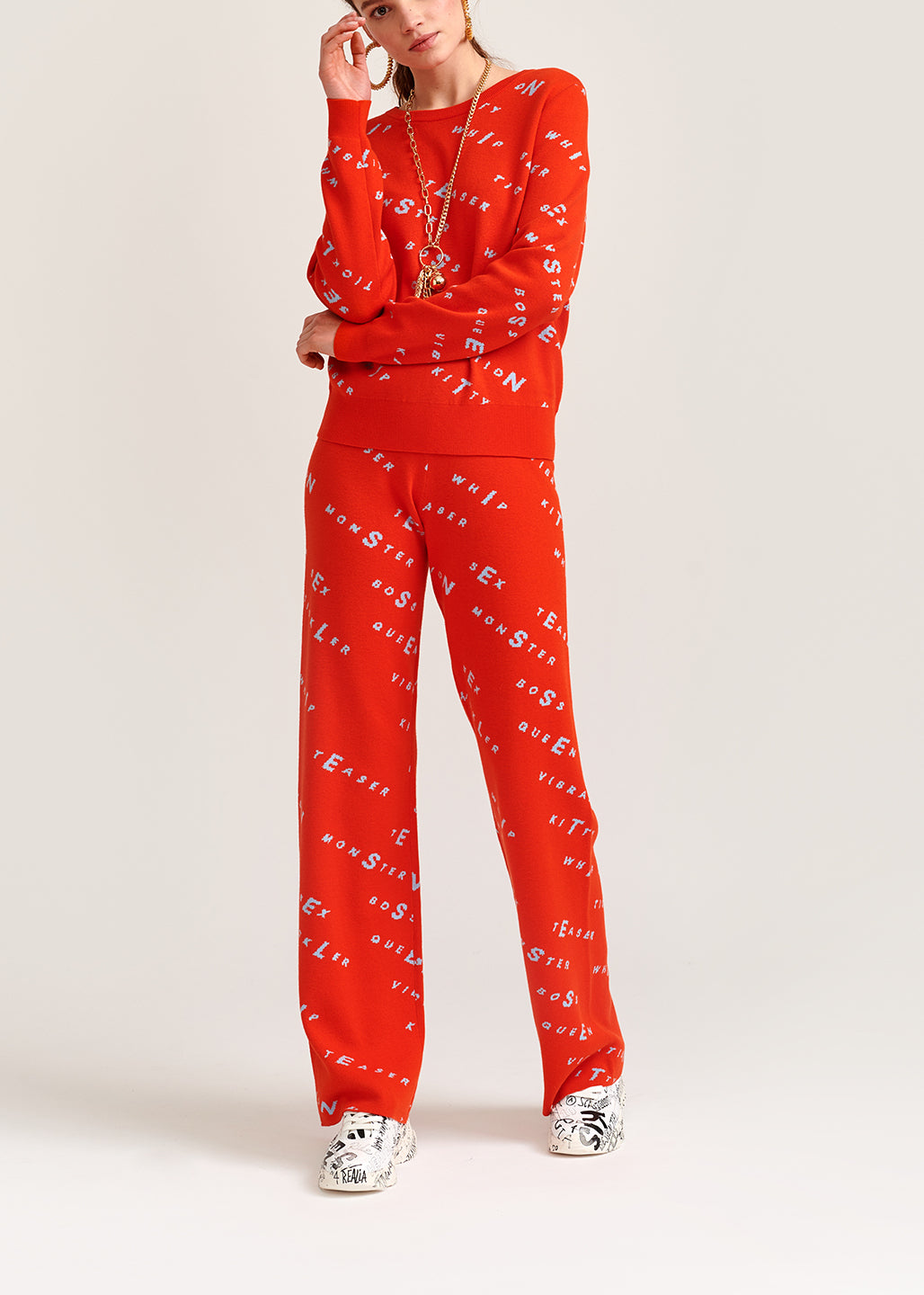 Orange knitted sweater with light blue print RE—SSENTIEL | Essentiel second hand