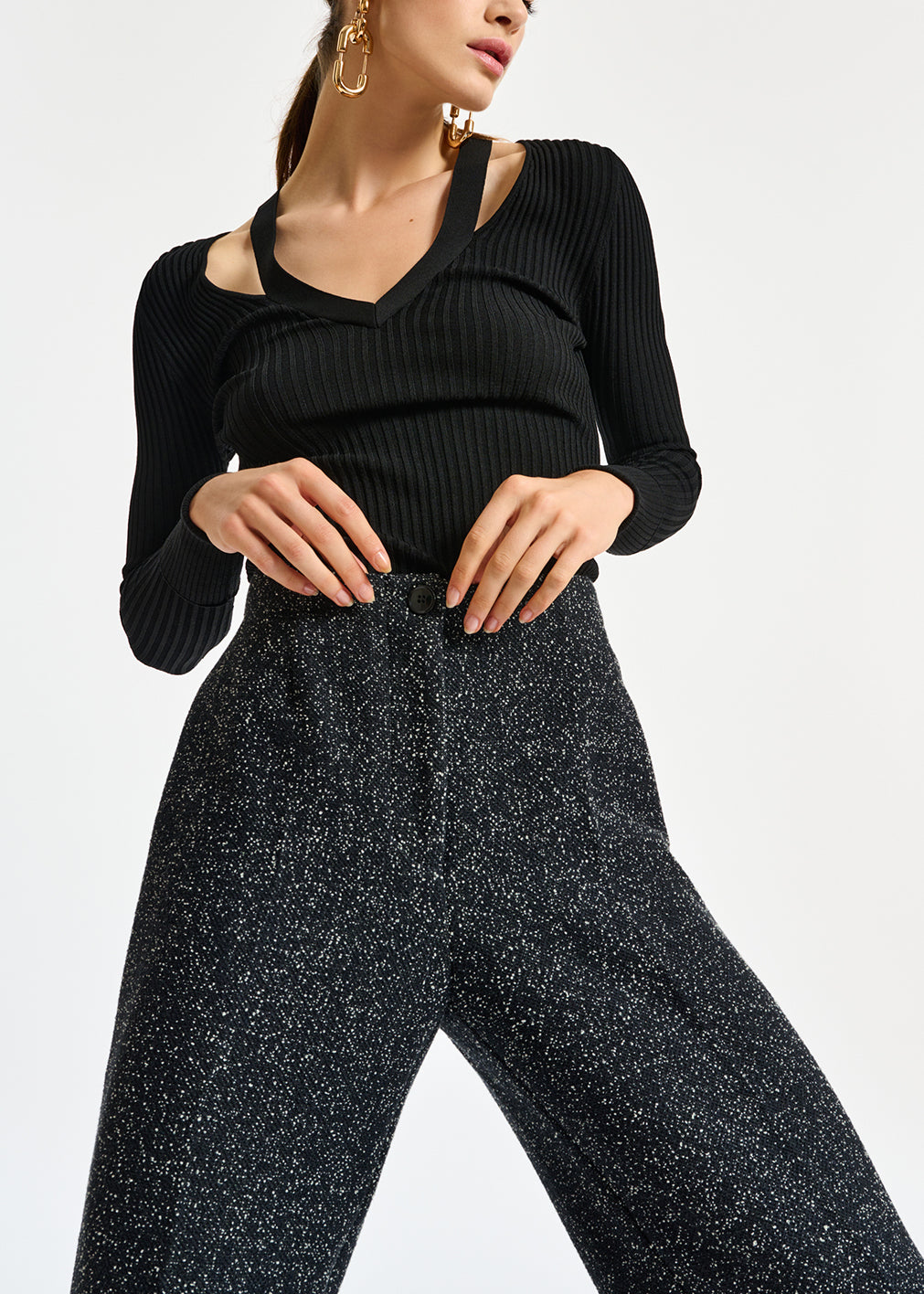 Black fine-knit V-neck sweater with cutouts RE—SSENTIEL | Essentiel second hand