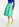 Midi-wikkelrok in turquoise jacquard Faume - seconde main