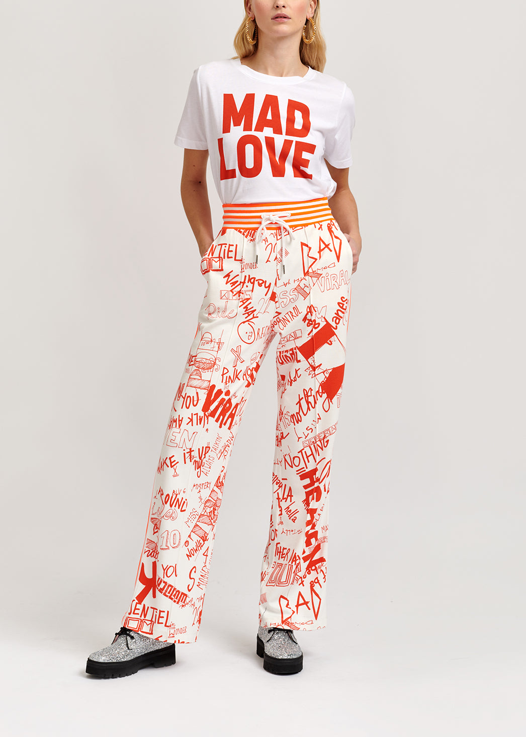 Orange and off-white printed track pants RE—SSENTIEL | Essentiel second hand