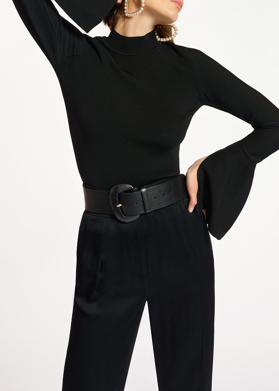 Black slim-fit knit sweater with trumpet sleeves RE—SSENTIEL | Essentiel second hand