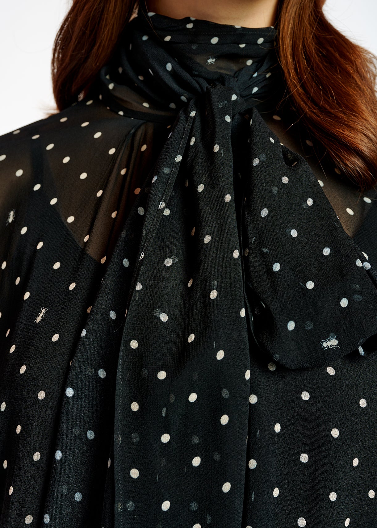 Zwart en witte volumineuze top met stippen RE—SSENTIEL | Essentiel second hand