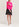 Pull maille côtelée rose aux manchettes rayées fluo Faume - seconde main