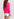 Neon pink ribbed-knit cardigan with striped neon cuffs Faume - seconde main