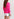 Cardigan maille côtelée rose aux manchettes rayées fluo Faume - seconde main
