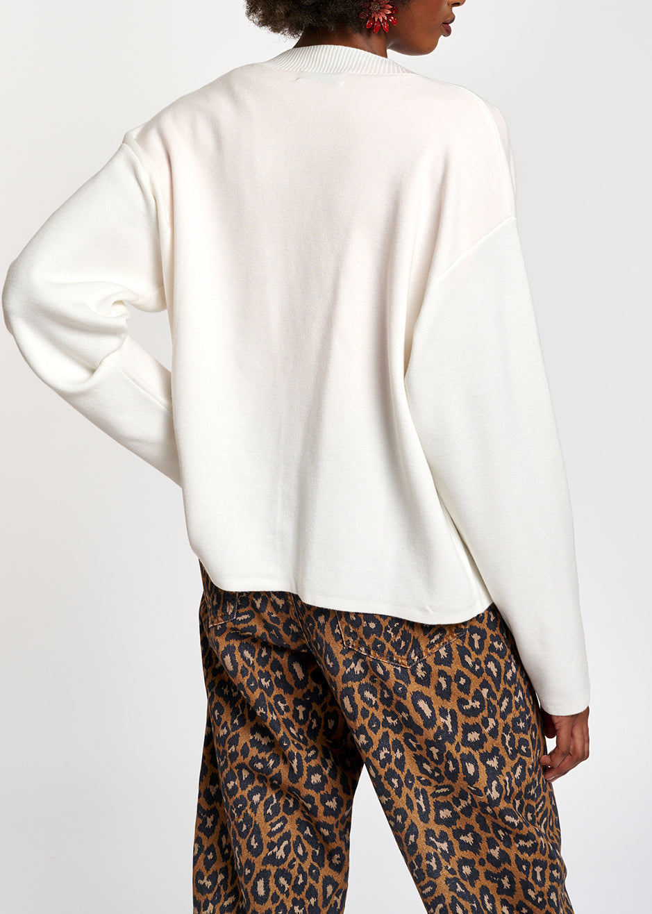 Cardigan blanc cassé avec boutons à strass RE—SSENTIEL | Essentiel second hand